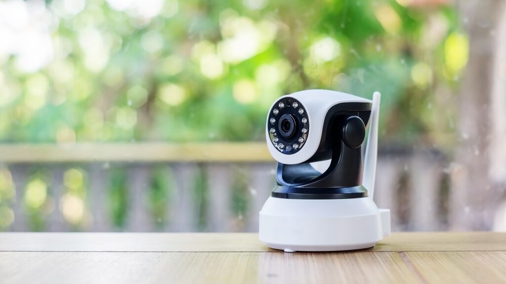 A Pet Monitoring Camera on a wooden table