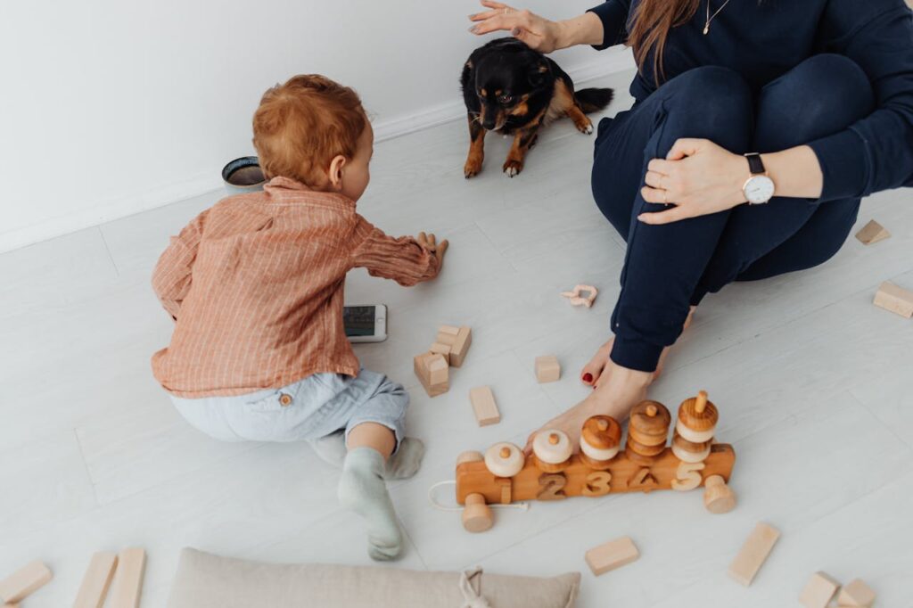 Dog playing indoors with family