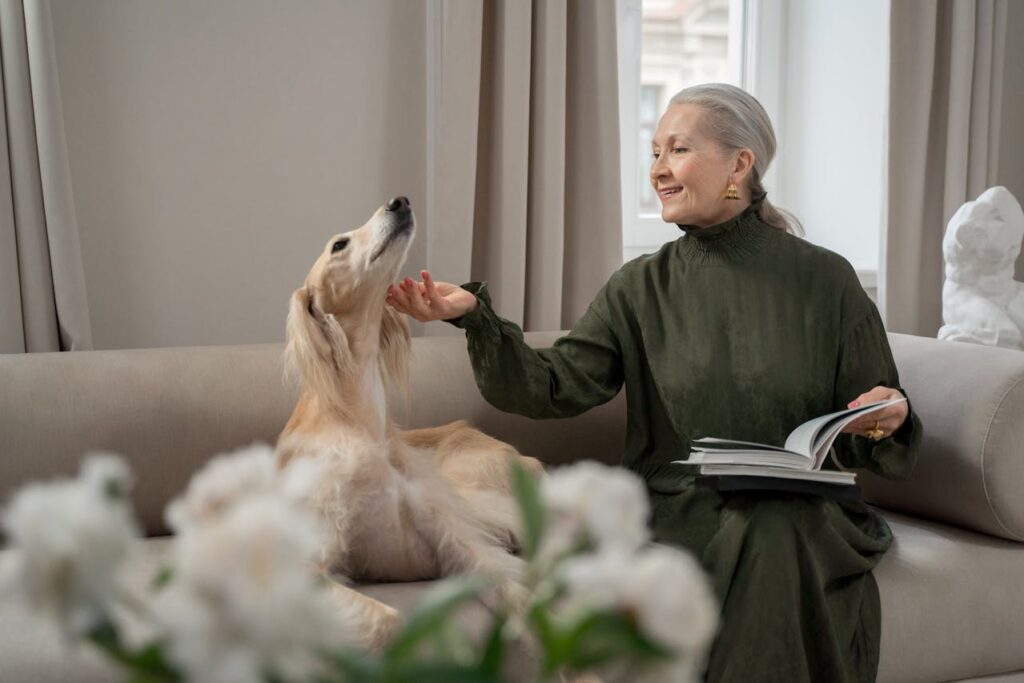 Elderly Woman Scratching her Dog Chin