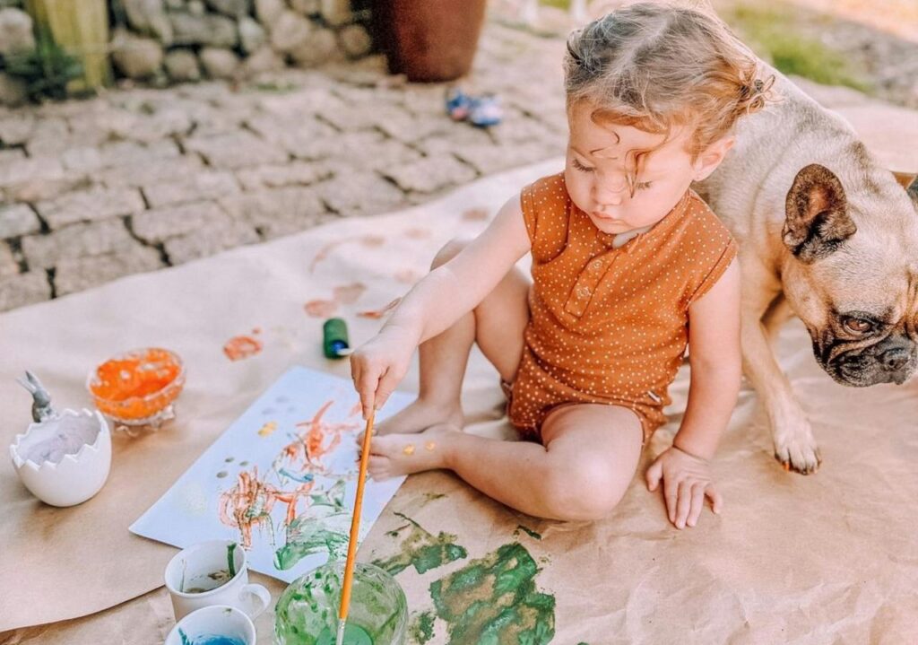 French bulldog with a kid