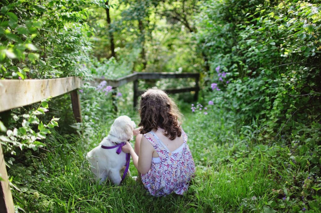 puppy in garden with kid