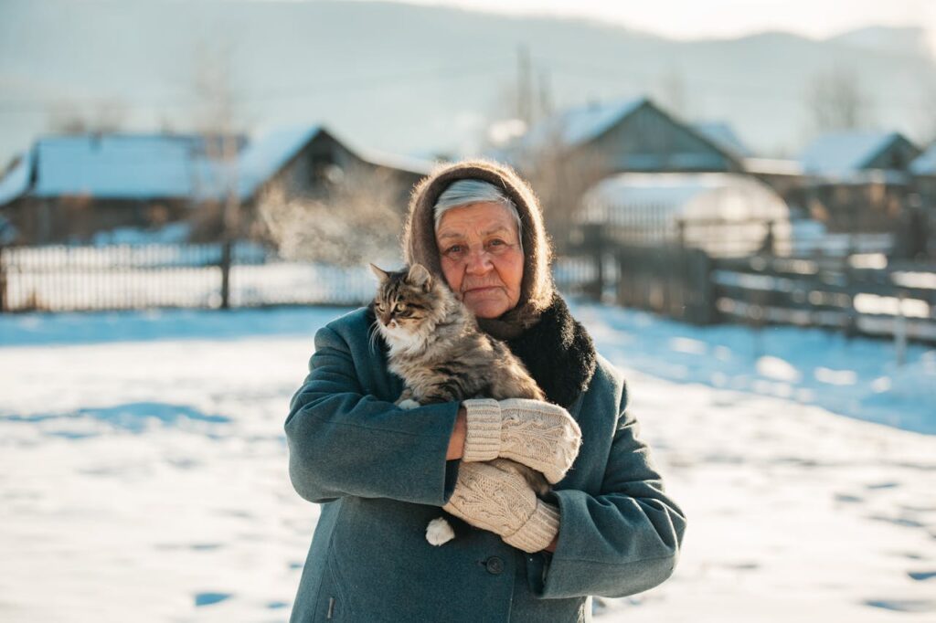 Old lady holding a cat