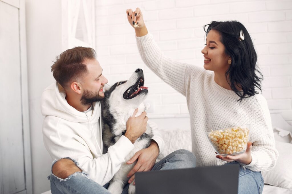 Beautiful couple spend time WITH DOG