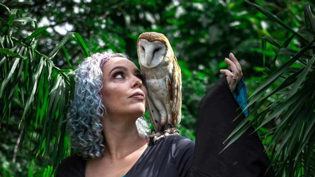 Owl on woman Shoulder
