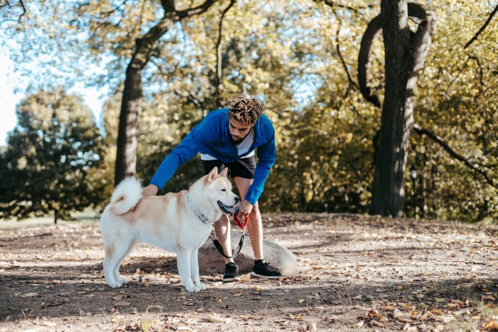 man with dog in a park