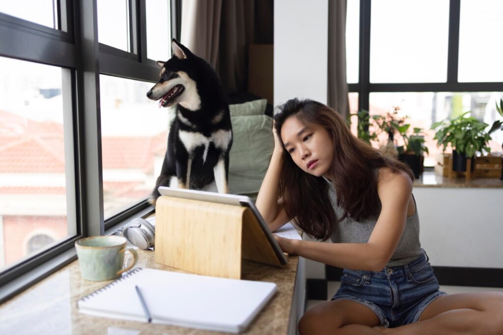 Dog with sad woman