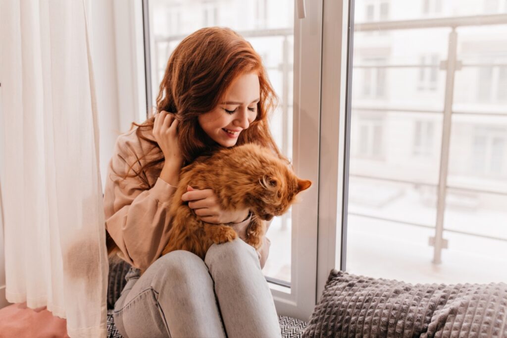 Happy Woman With Cat