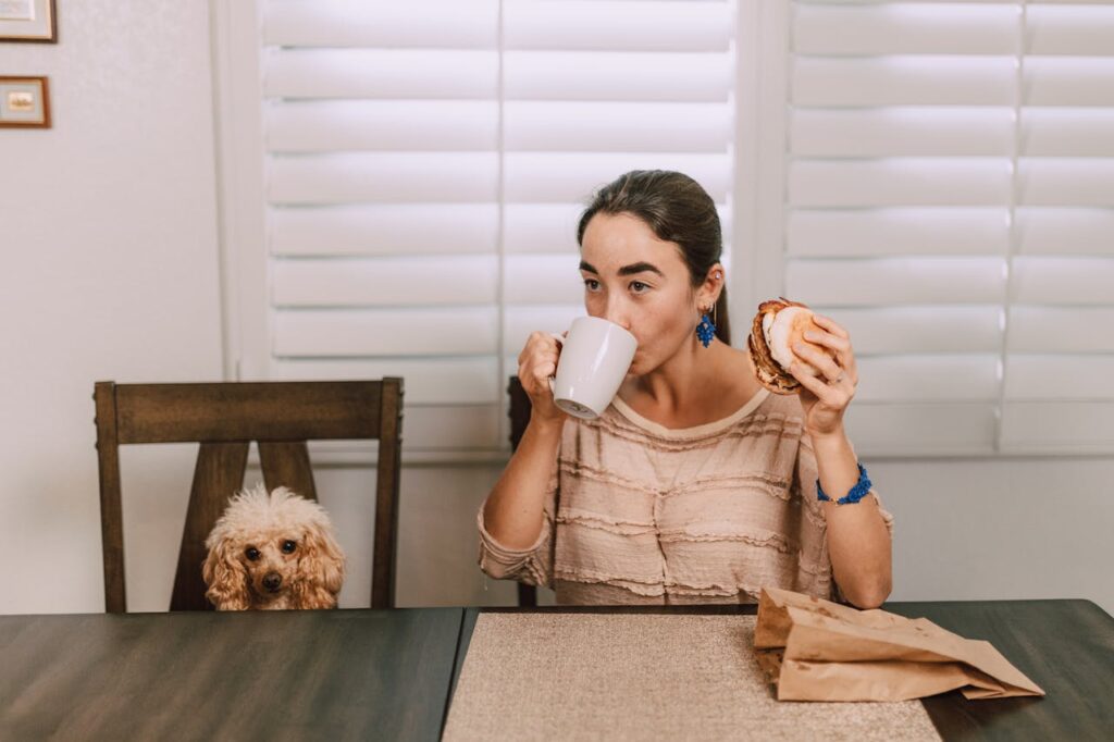 woman reading with dog