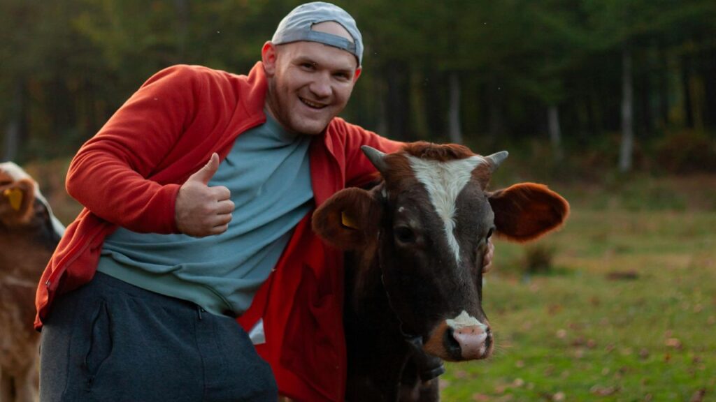 Man With a Cow smiling