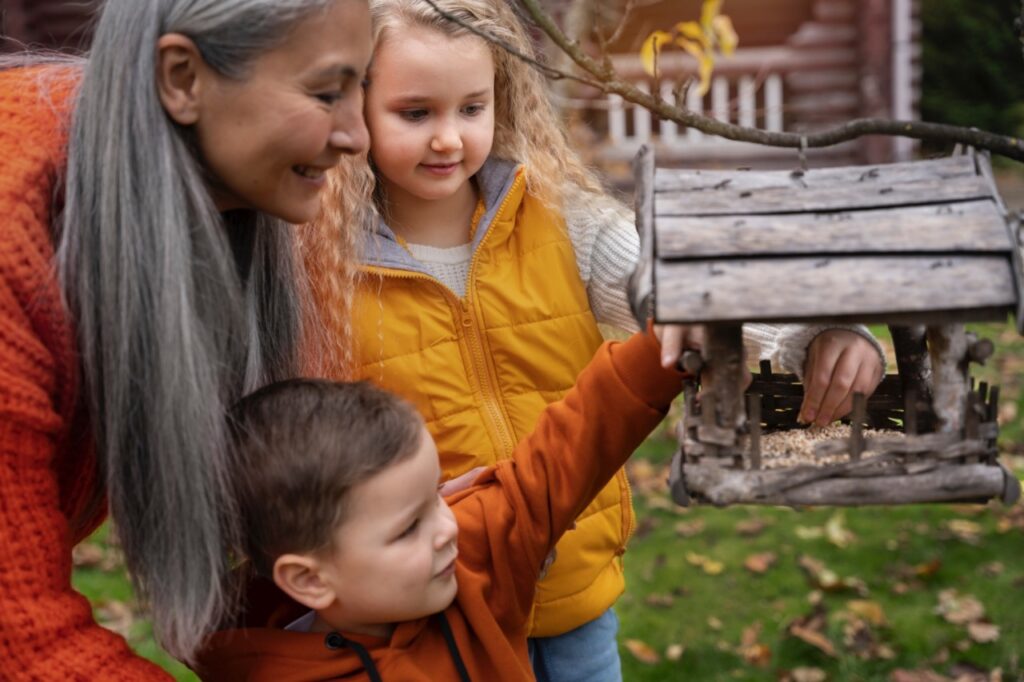 Family Seeing Bird Feeder