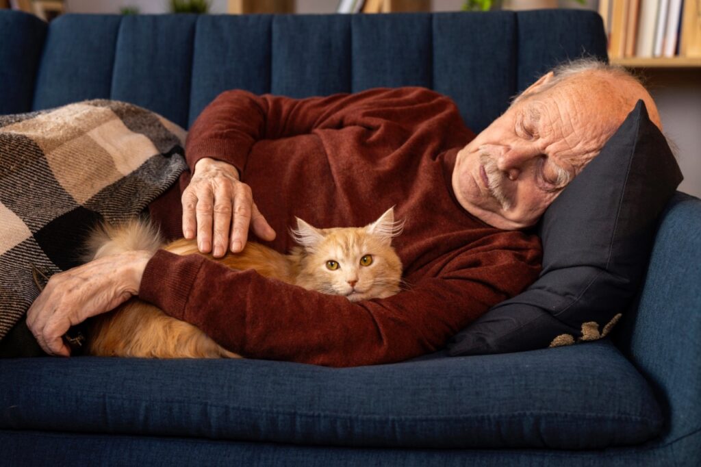Senior Person Sleeping with cat