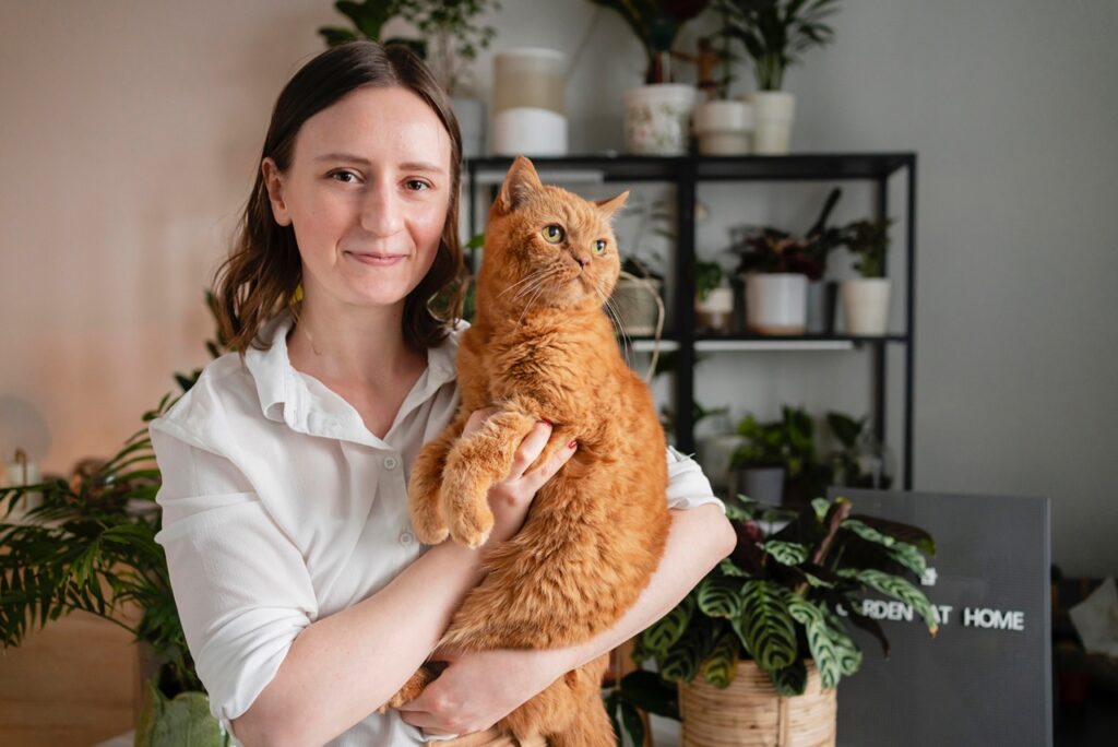 Woman Holding A Cat