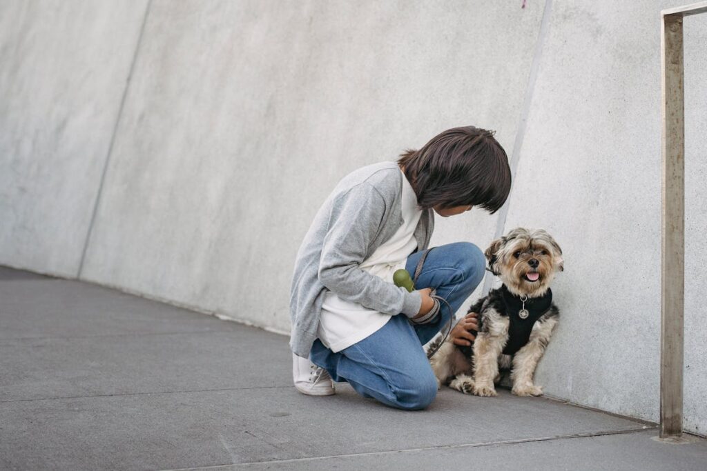 little-boy-stroking-dog